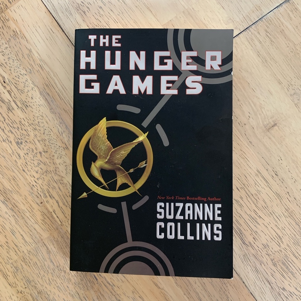 The Hunger Games by Suzanne Collins Paperback  - Black and Gold Edition